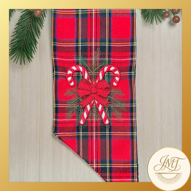 Candy cane design on a red plaid sash.