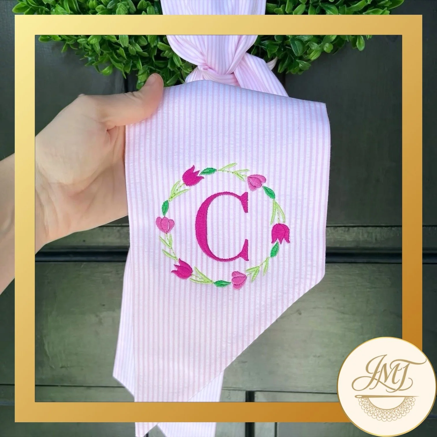Tulip Wreath Premium Initial on a pink seersucker sash.