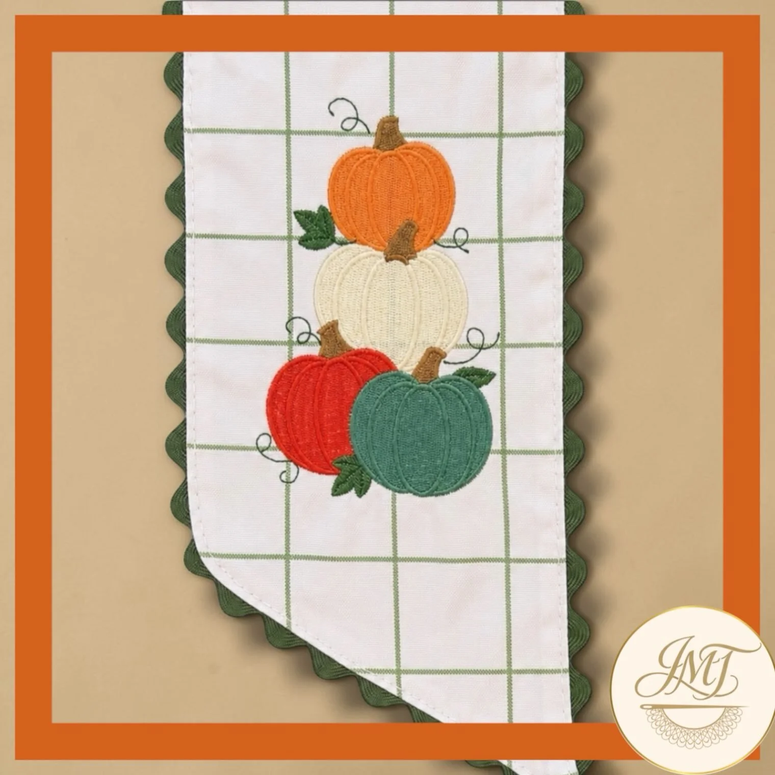 Stacked pumpkins on a green windowpane check sash.