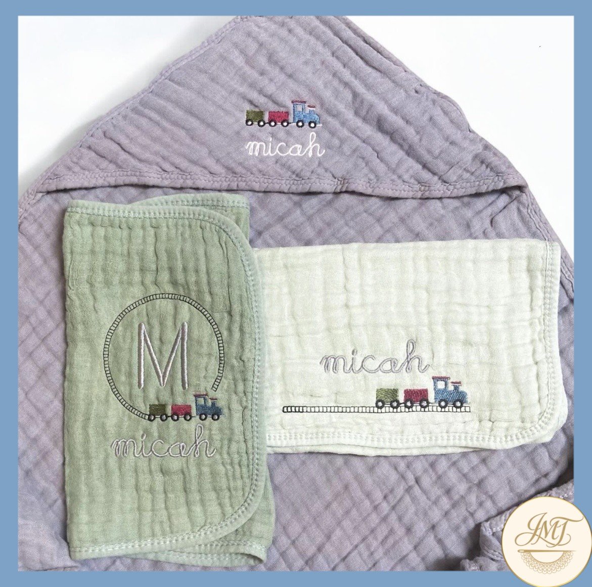 Train-themed muslin hooded towel and burp cloths.