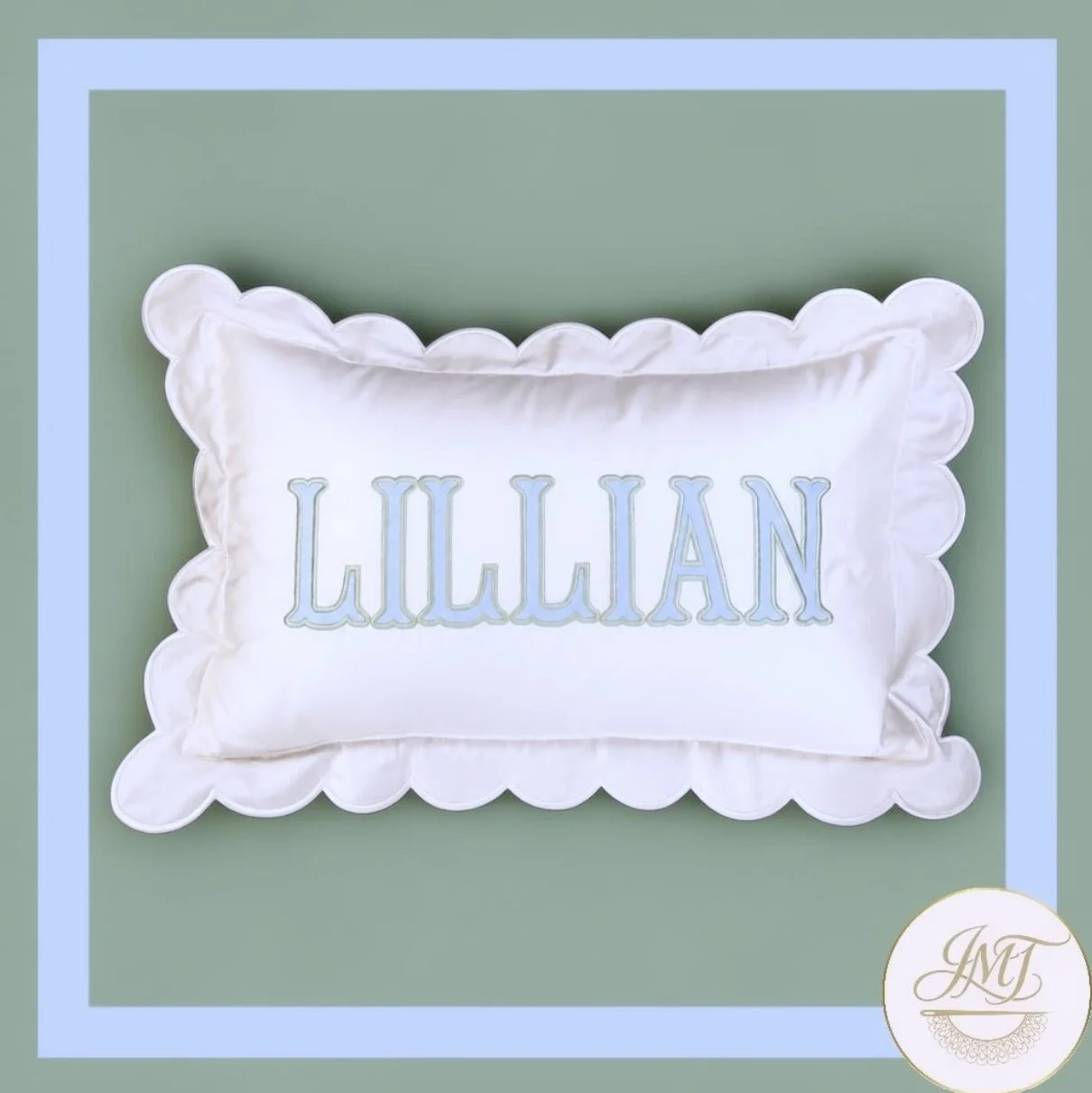Scalloped accent pillow with fabric applique letters. Perfect for the nursery rocking chair or other nursery decor.