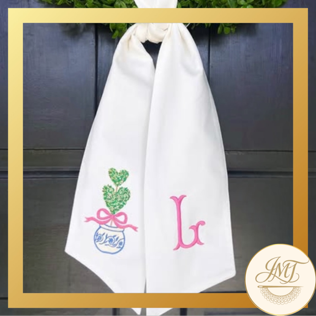 Heart Topiary design and a Standard Initial on a white sash.
