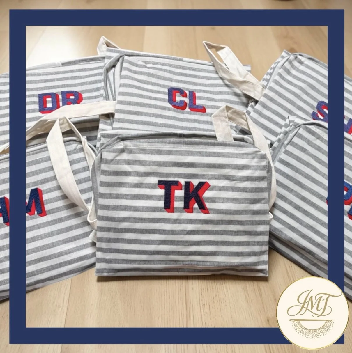 Embroidered folding laundry bags.