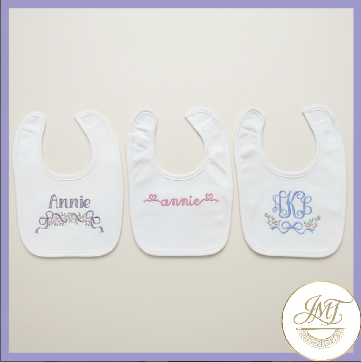 Boutique baby bibs with floral frames and monograms.