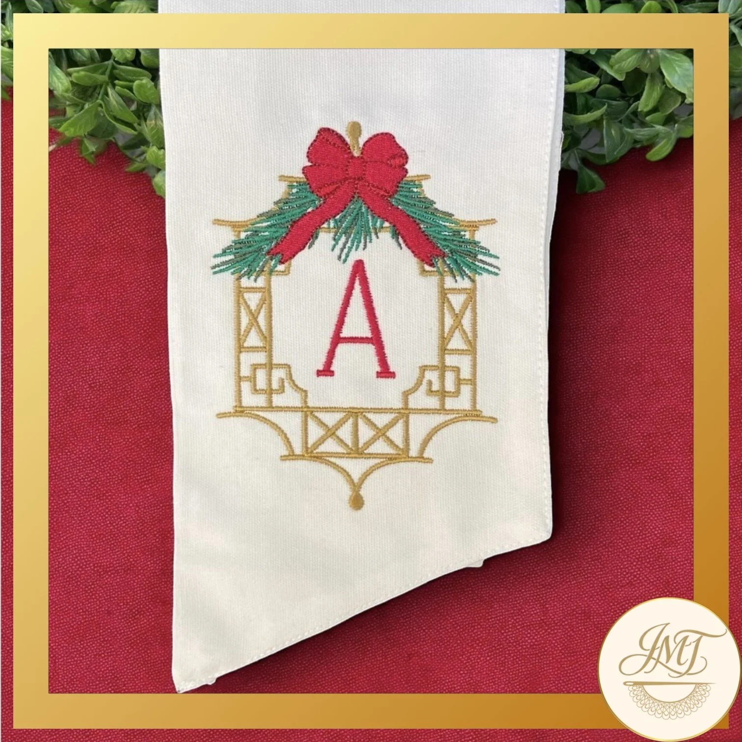 Chinoiserie Premium Initial on a khaki sash.