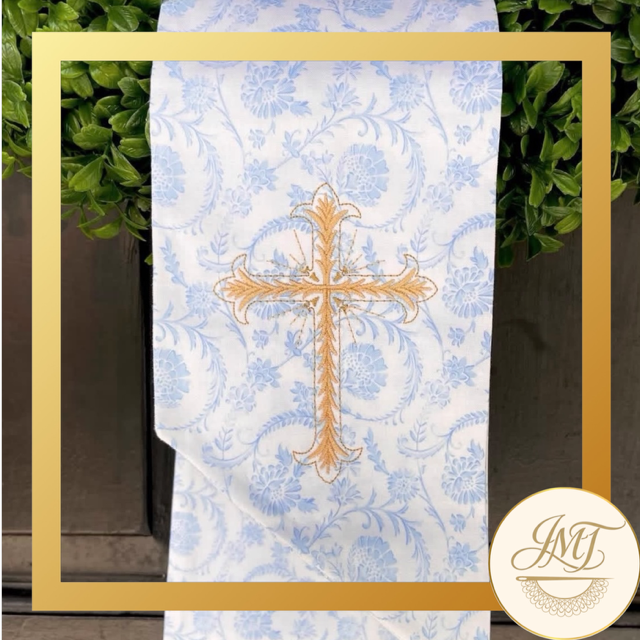Simple Cross design on a blue floral sash.