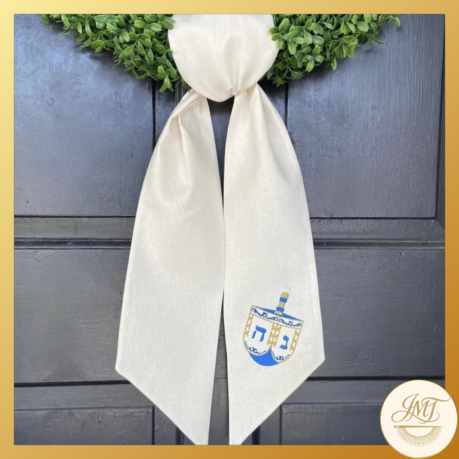 Dreidel design on an off-white sash.