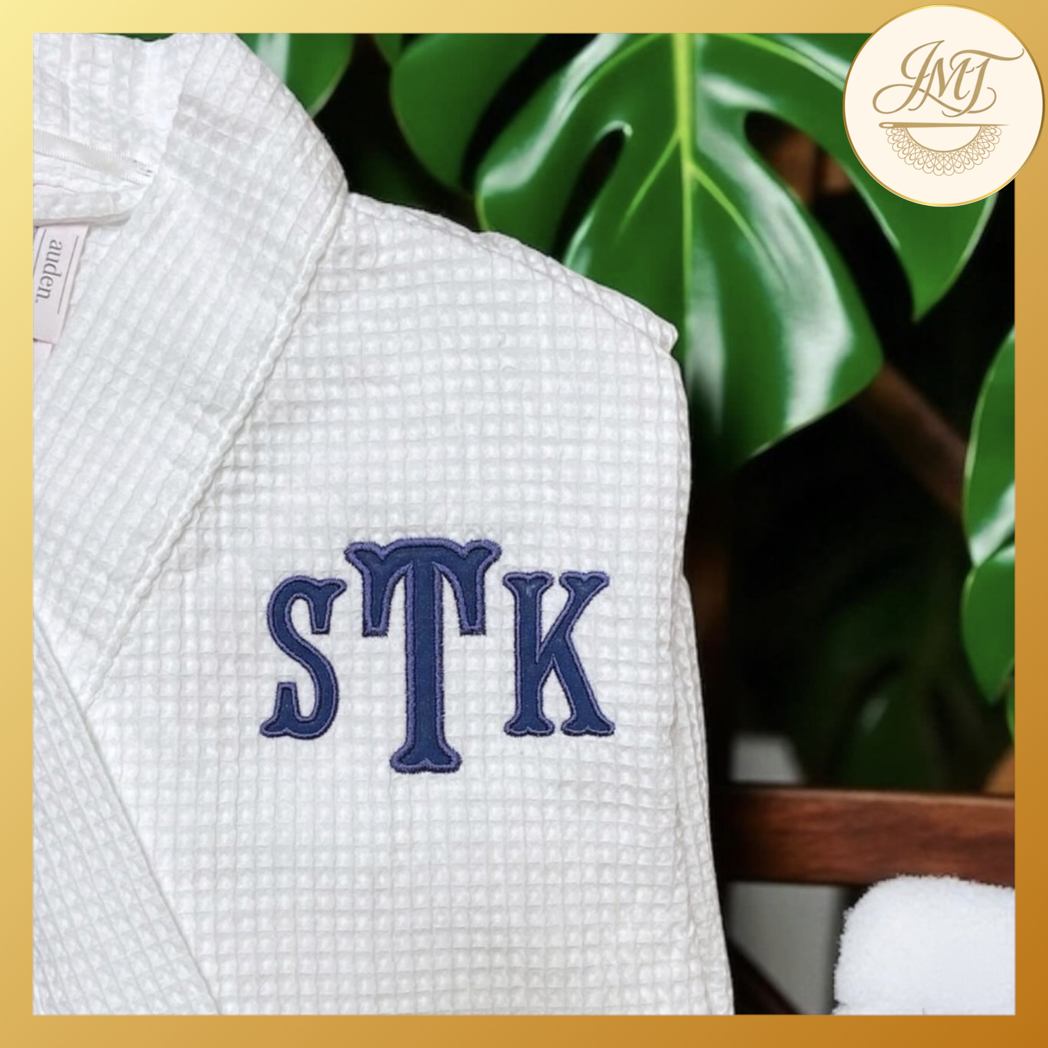 Cozy robe with an applique monogram.