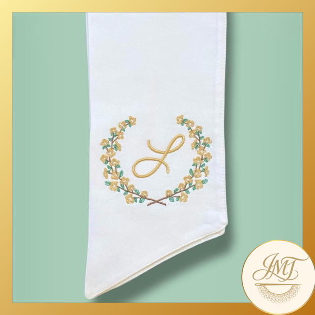 Dogwood Premium Initial on a white sash.