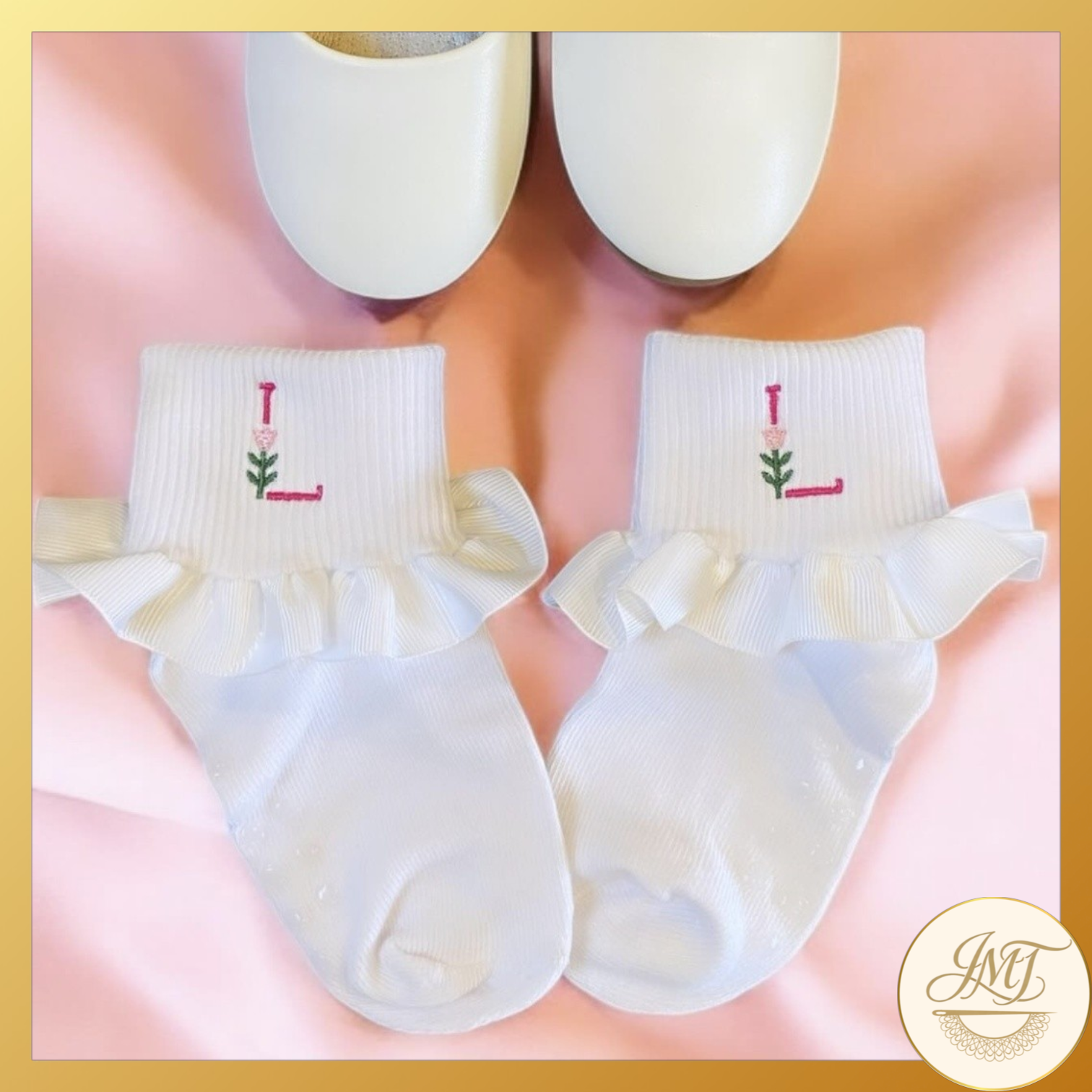 Dainty embroidered initial dress socks.