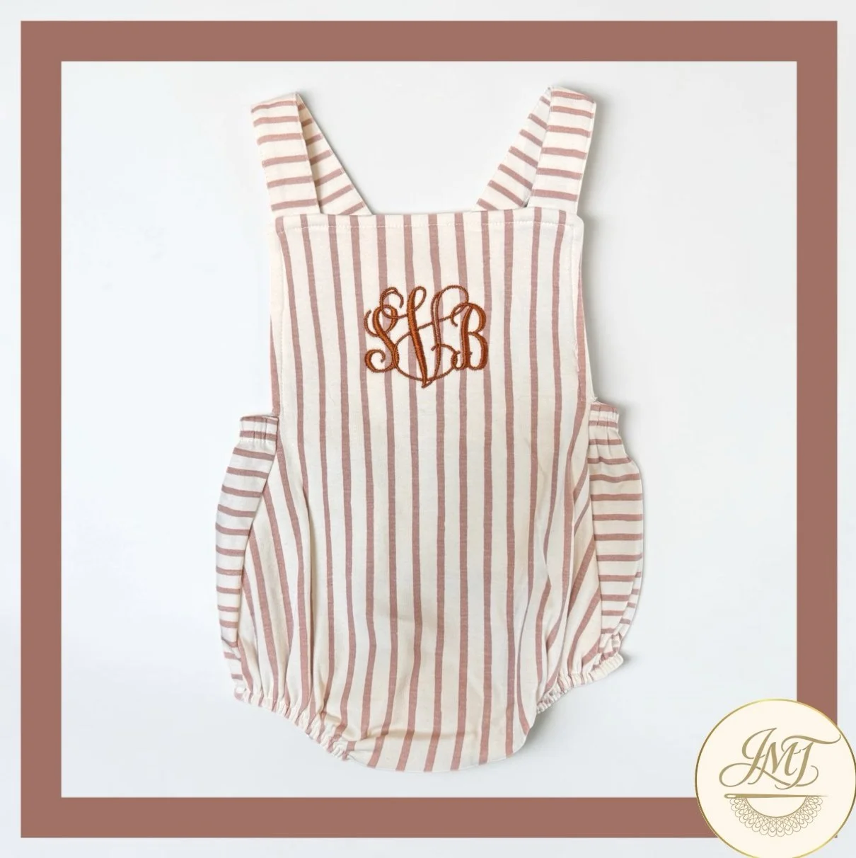 Simple yet dainty monogram on a sleeveless bubble romper.