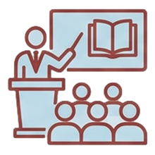 Educator pointing at a presentation screen with an open book, in front of an audience in a classroom.