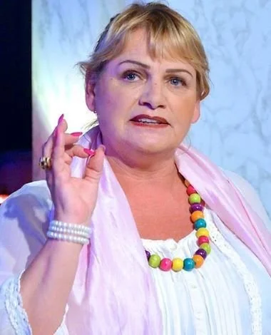 A woman (Soraya Post) speaking and gesturing with her hand.