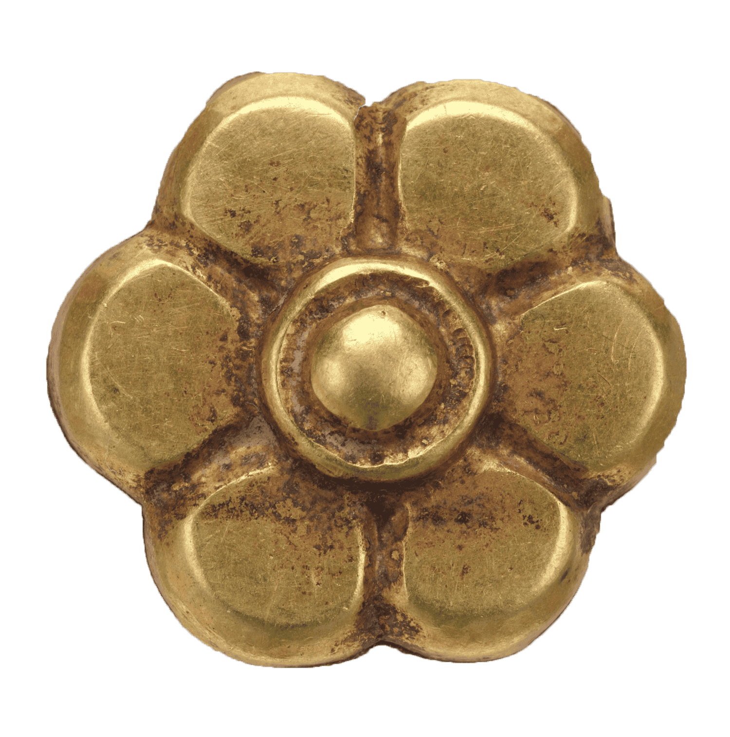 A gold-colored, flower-shaped object with six rounded petals and a central circular depression.
