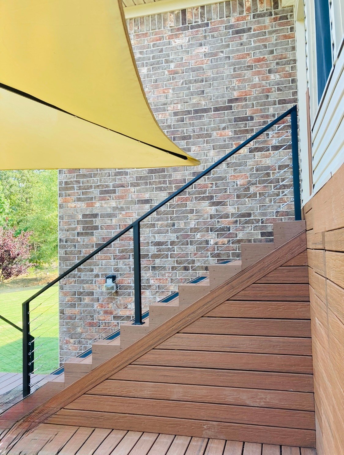 rj-construction-08-brown-stairs-cable-railing.jpg
