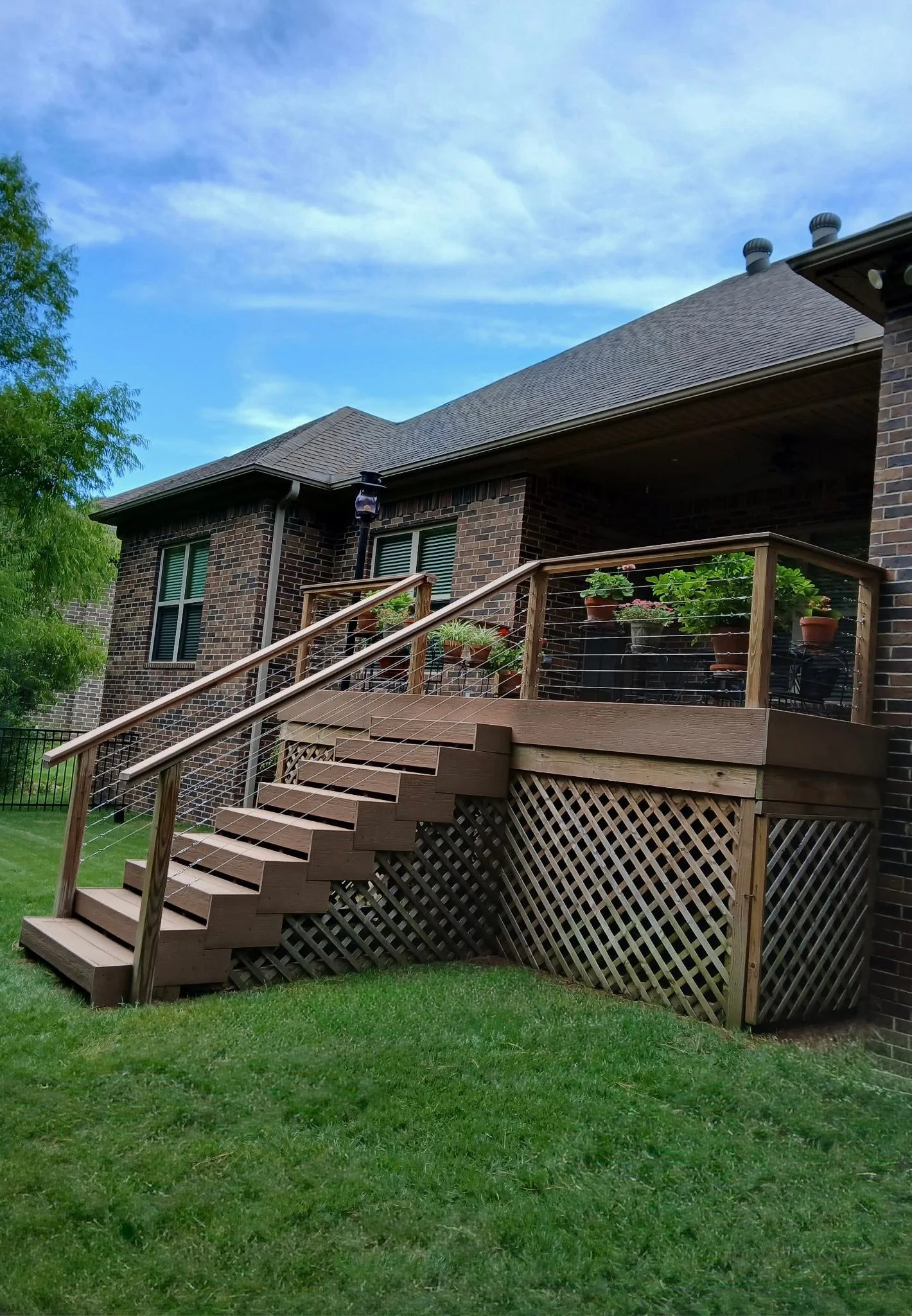 rj-construction-05-brown-deck-cable-railing.jpg