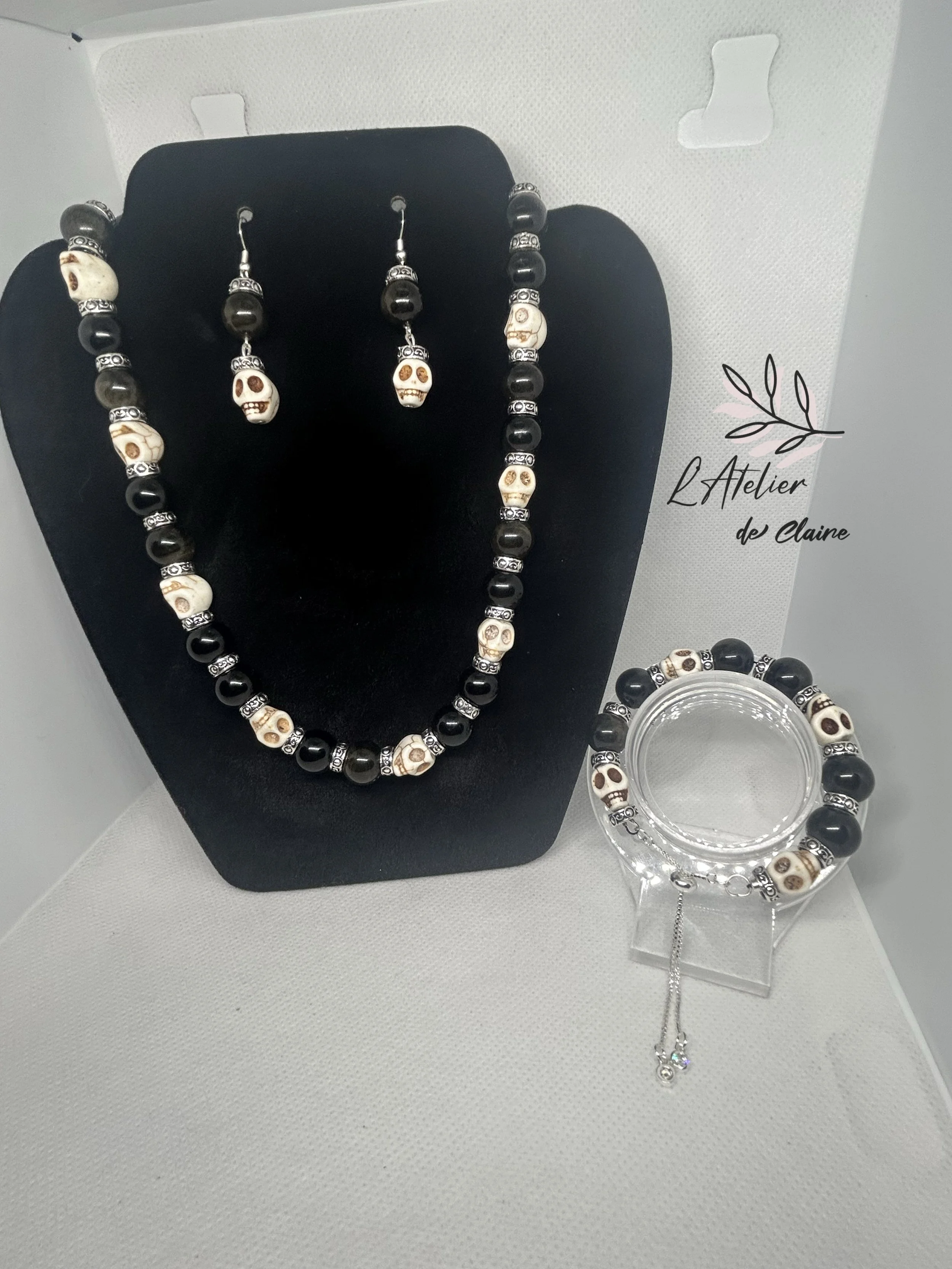 Handmade jewellery set in carved white turquoise and golden obsidian