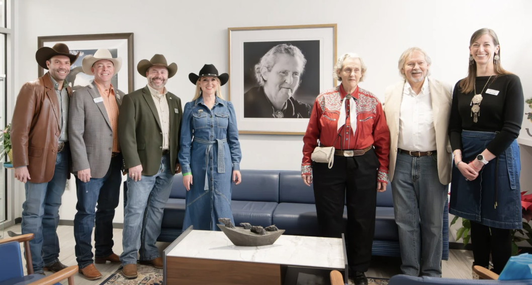 Temple Grandin with guests at the unveiling of her portrait at the Temple Grandin Equine Center.