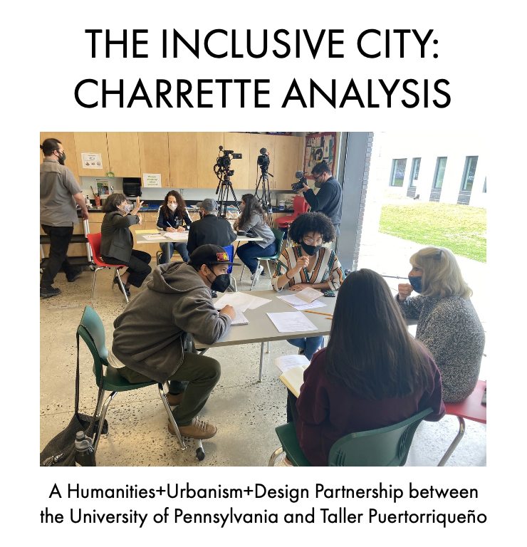 A diverse group of people in a classroom or meeting room participating in a discussion. Some are taking notes, and there are cameras and crew filming the session. The setting suggests an academic or community event.