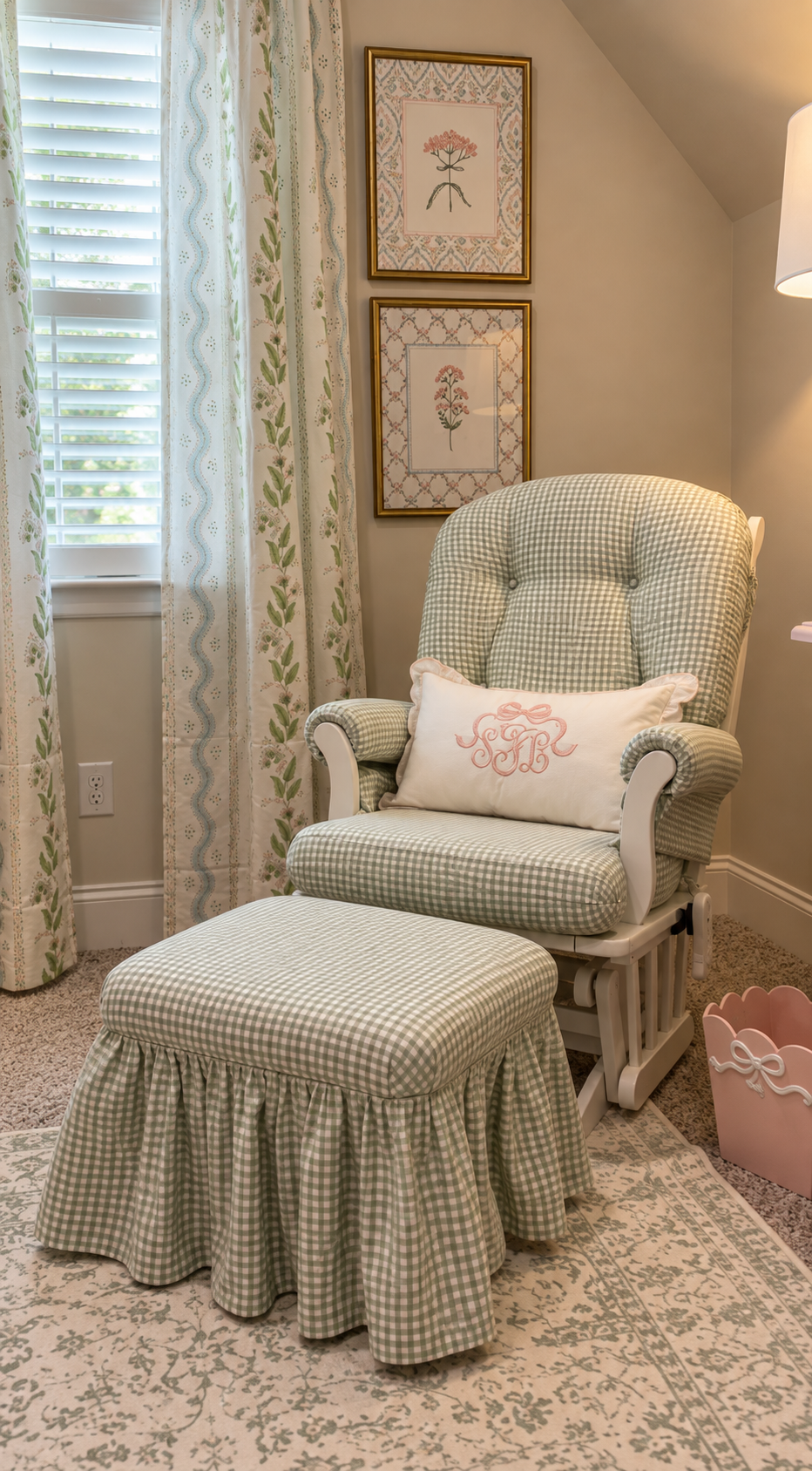 A cozy room corner with a light green gingham-patterned armchair and matching footstool, decorative curtains with a floral pattern, and framed botanical artwork on the wall. There is a white pillow with pink embroidery on the chair and a pink decorat