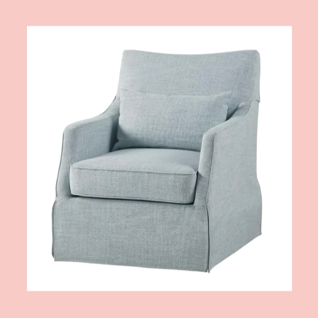 Light gray upholstered armchair with a matching pillow, set against a white background with a pink border.