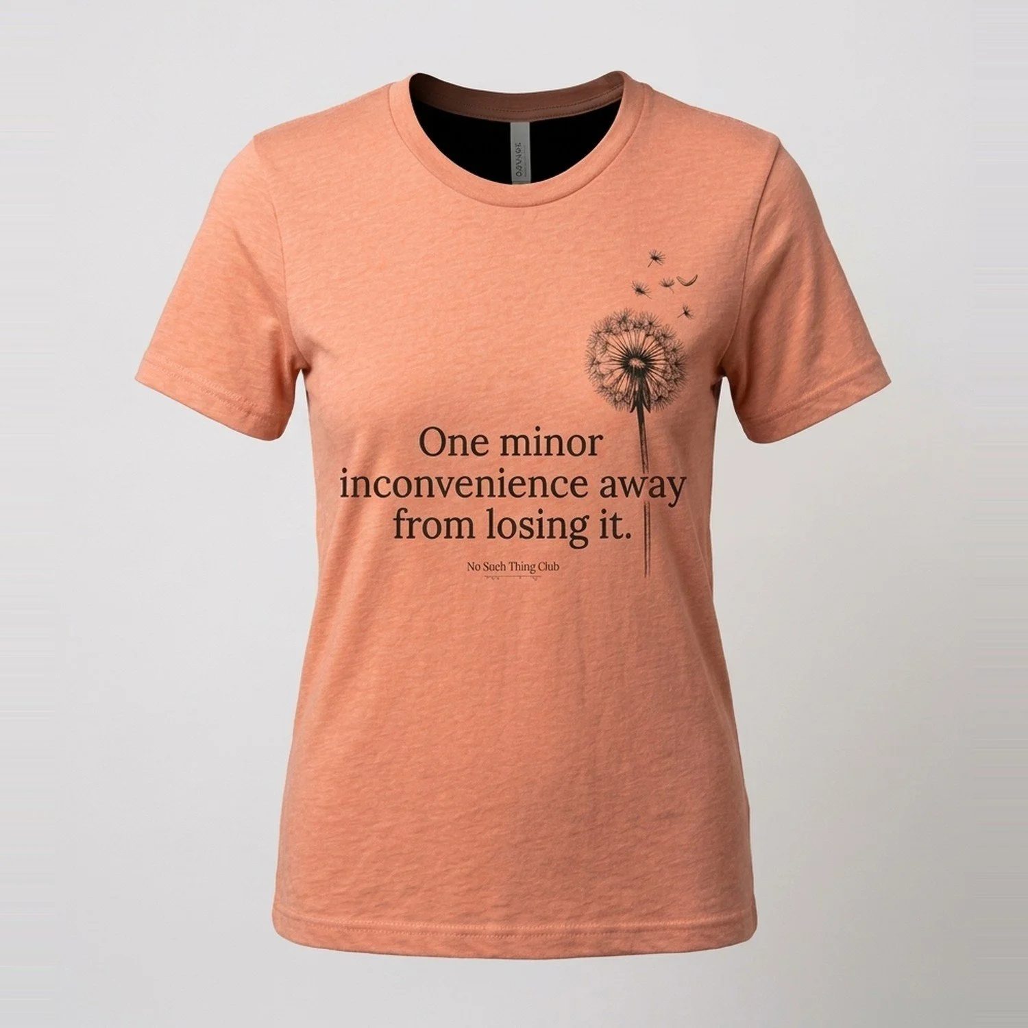 Heather Sunset tee on a gray background, printed in black with "One minor inconvenience away from losing it."