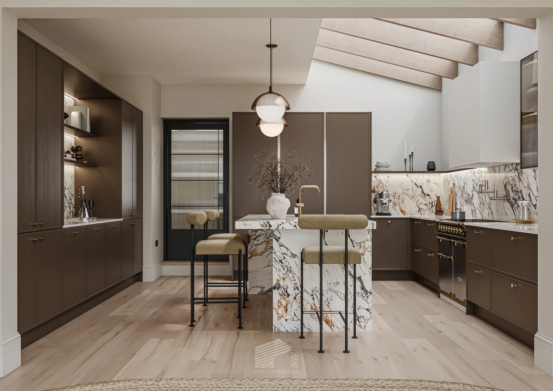 Modern kitchen with a marble island, dark cabinetry, light wood flooring, and a sloped ceiling with exposed wooden beams. There are bar stools at the island, and built-in shelves with decorative items on the left.