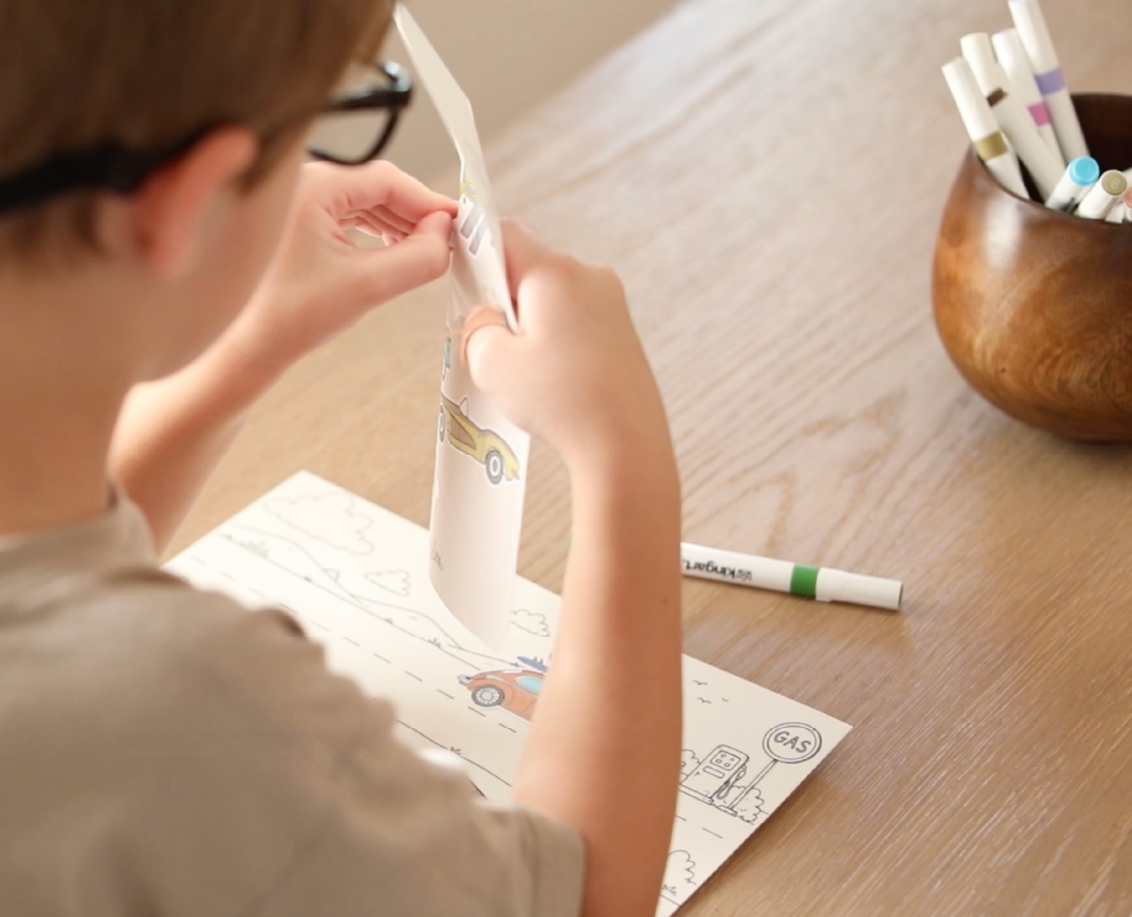 child-using-color-create-sticker-sheet.jpg