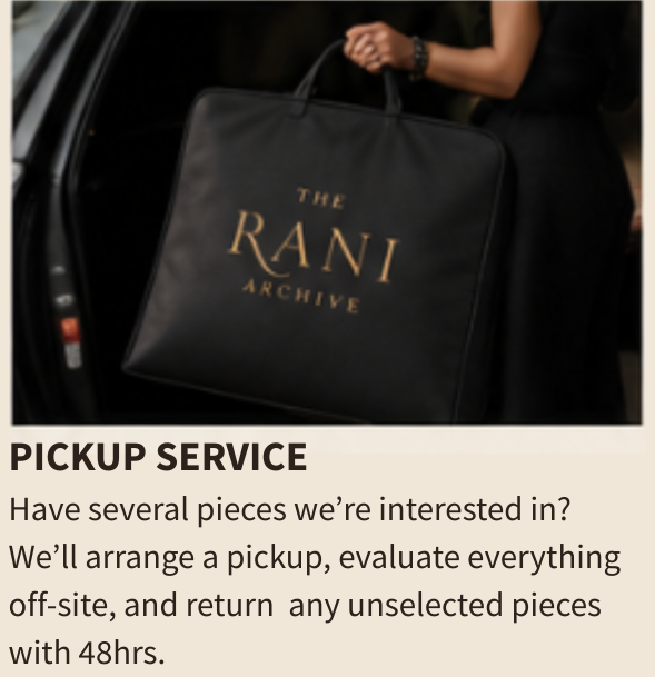 Person holding a black bag with gold lettering that says "The Rani Archive".