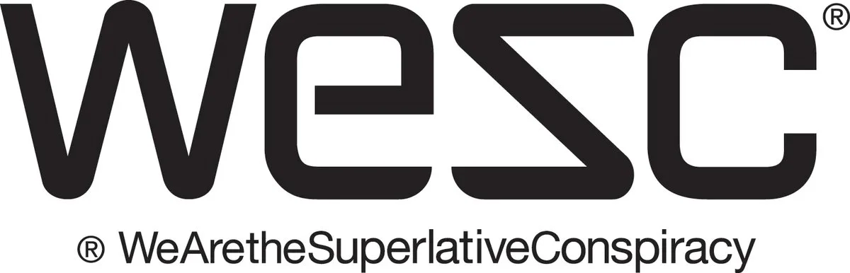 Logo for WeAretheSuperlativeConspiracy (WESC), featuring stylized black text on a white background.