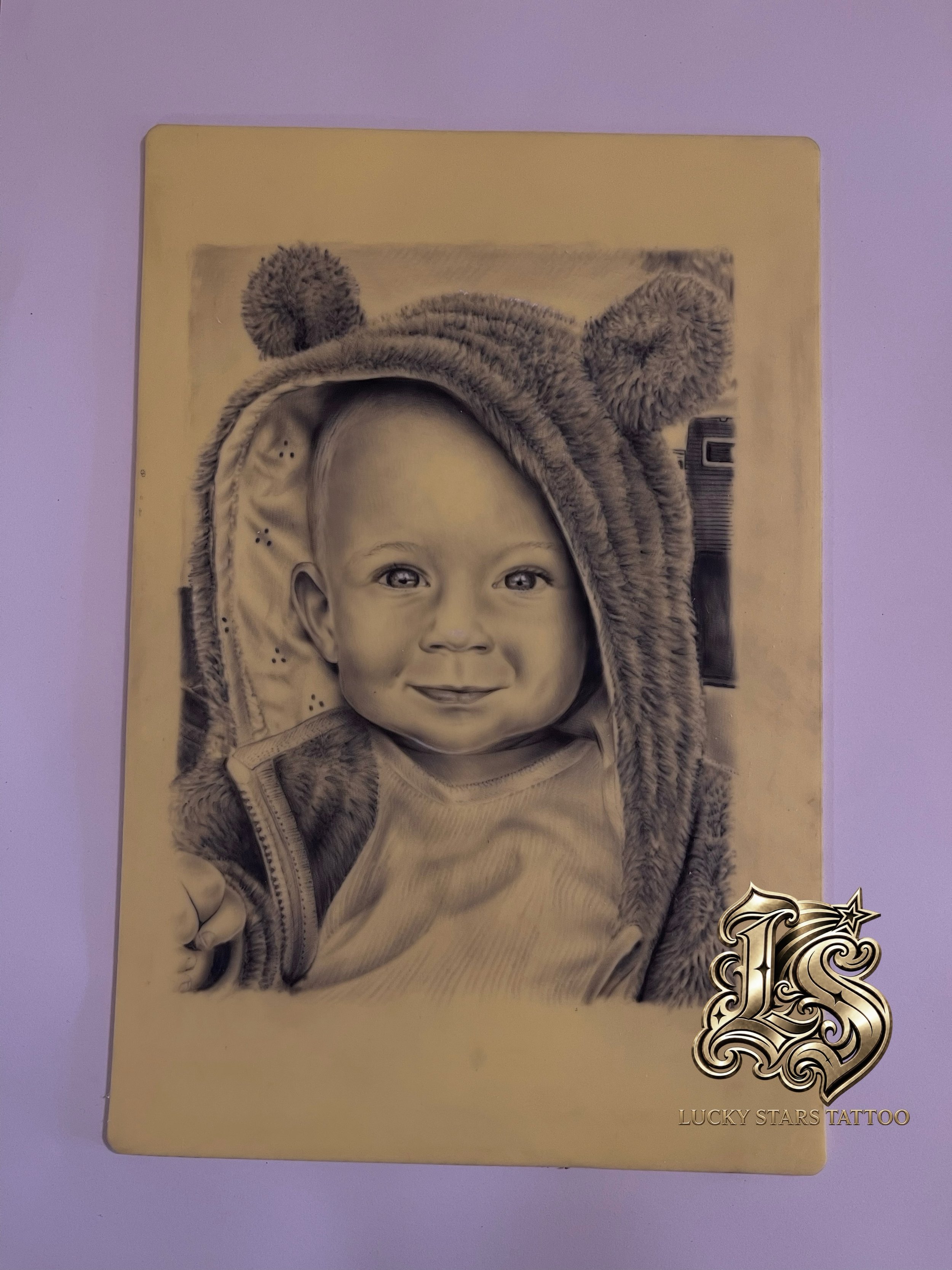 Portrait of my son, completed on A4 synthetic practice skin.

This black and grey realism piece took approximately 8.5 hours from start to finish. I used the portrait as an opportunity to work on subtle skin tones, facial detail, expression and the d