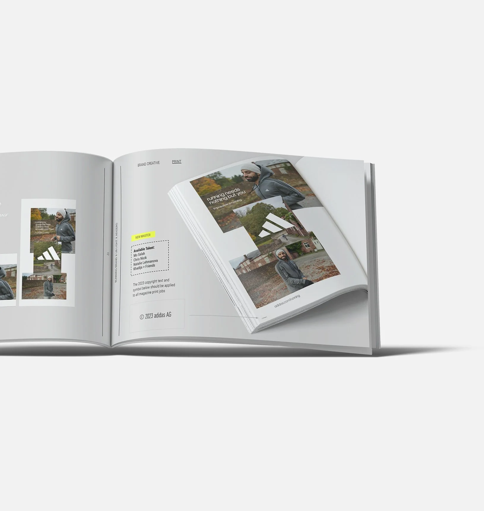 Open magazine showing fashion photos of a man in an outdoor setting and text about Adidas.
