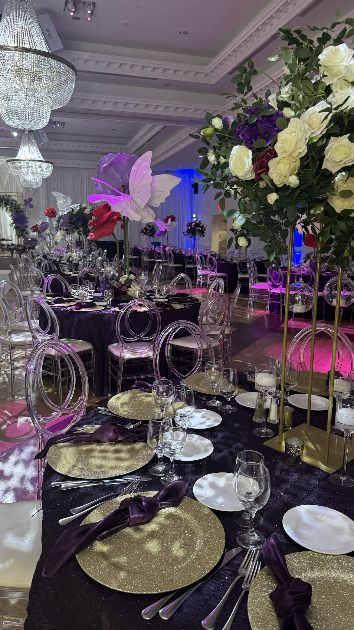 LBC Events & Co event styling. Colourful, aesthetic, flowery, greenery, garden, butterfly, gardenscape, event decor. Gold, white, purple, burgendy, green, yellow. Portfolio.