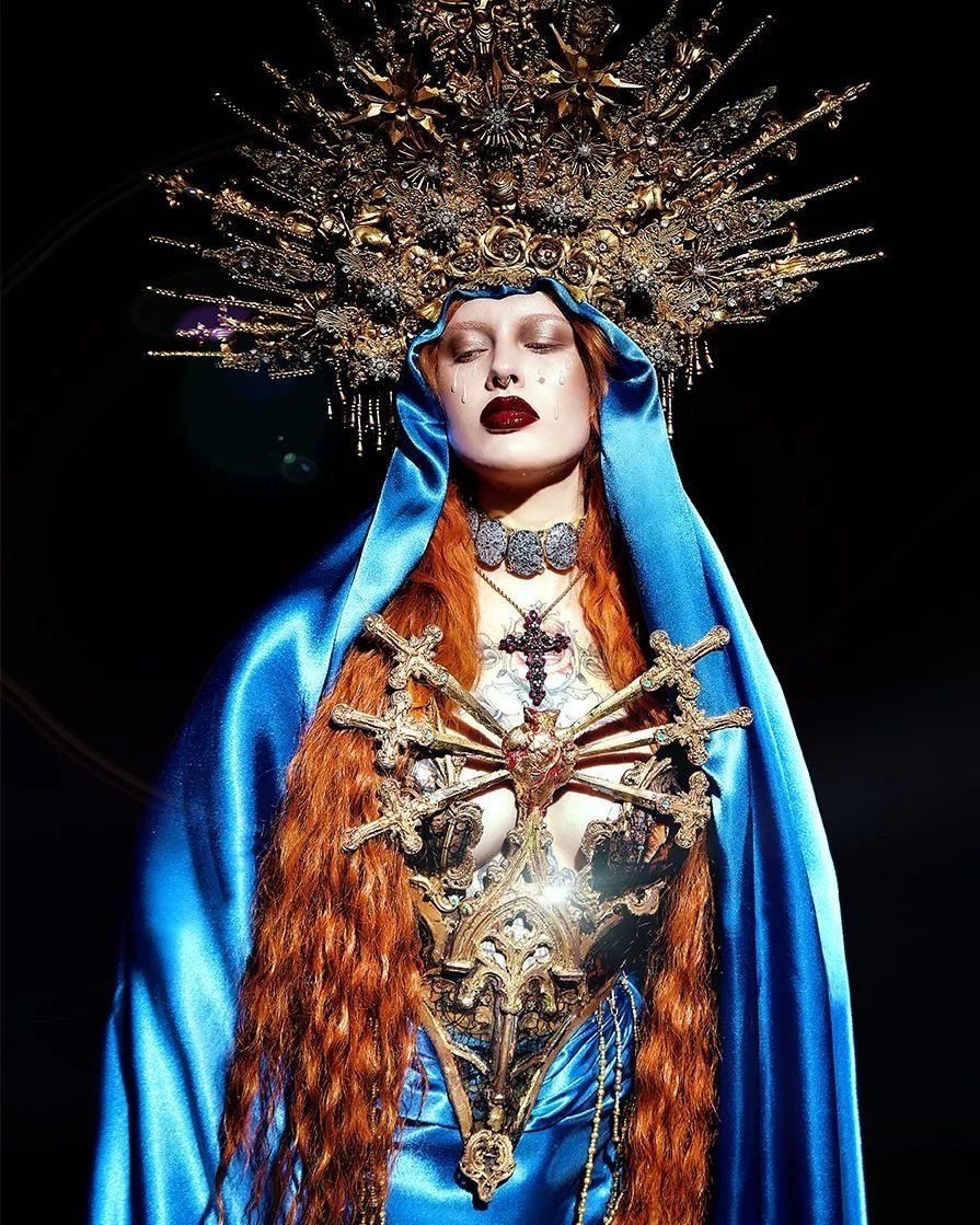 Gilded halo and sacred-heart adornments