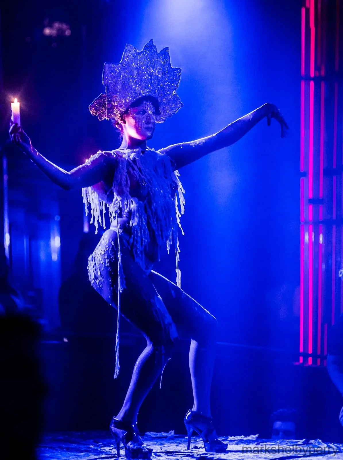 Full-length candle performance. Past Astarte Creative performance.