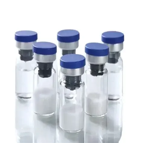 Six glass vials with blue caps and black rubber stoppers arranged in a semicircle on a white background.