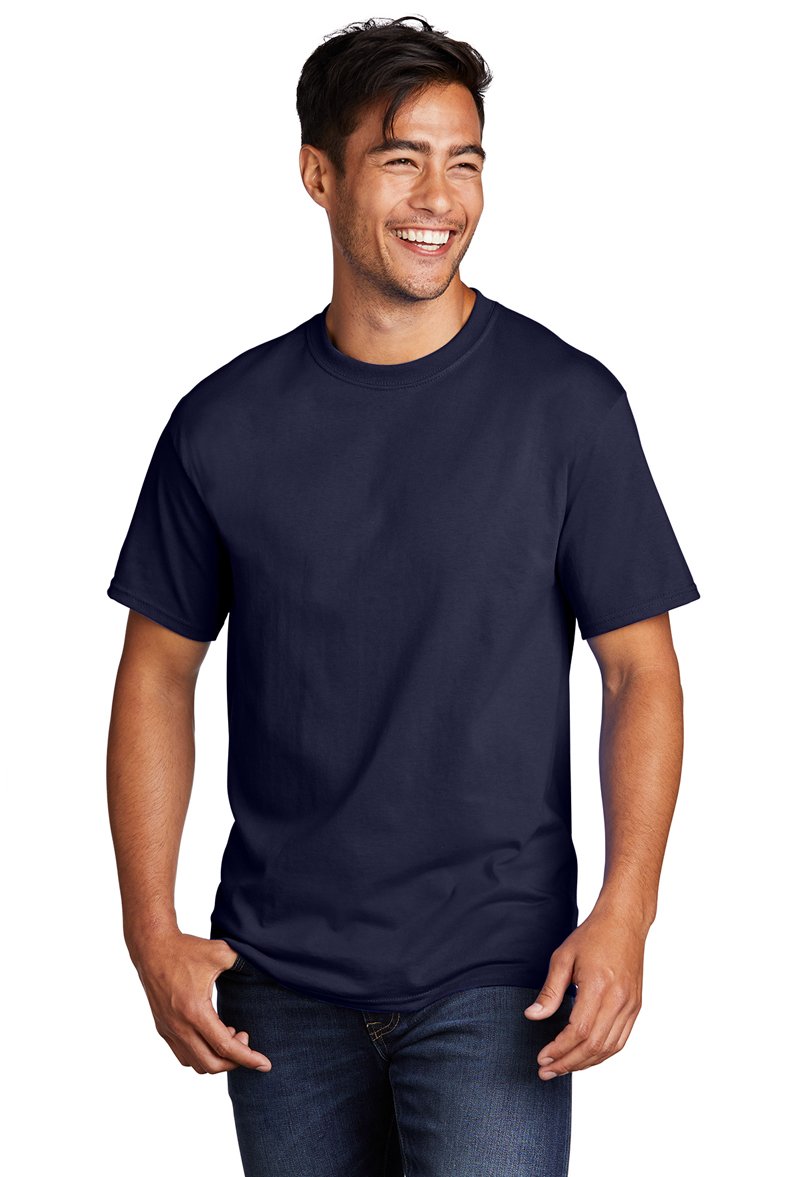 A smiling man wearing a navy blue t-shirt and jeans against a white background.