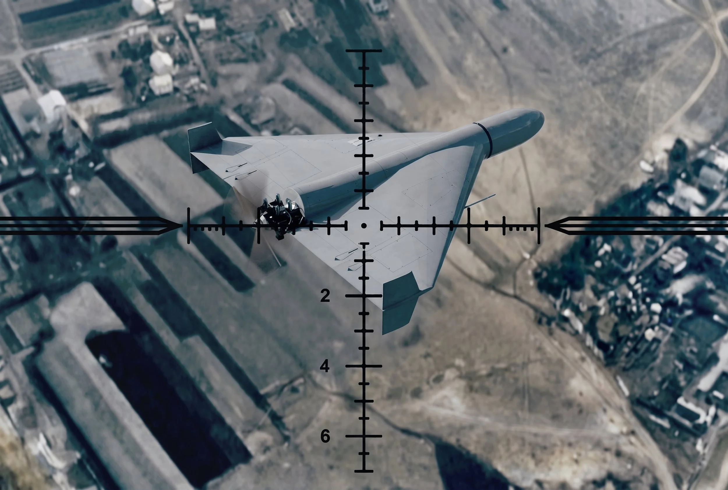 A fighter jet viewed from above through a targeting scope over a city with buildings and roads.