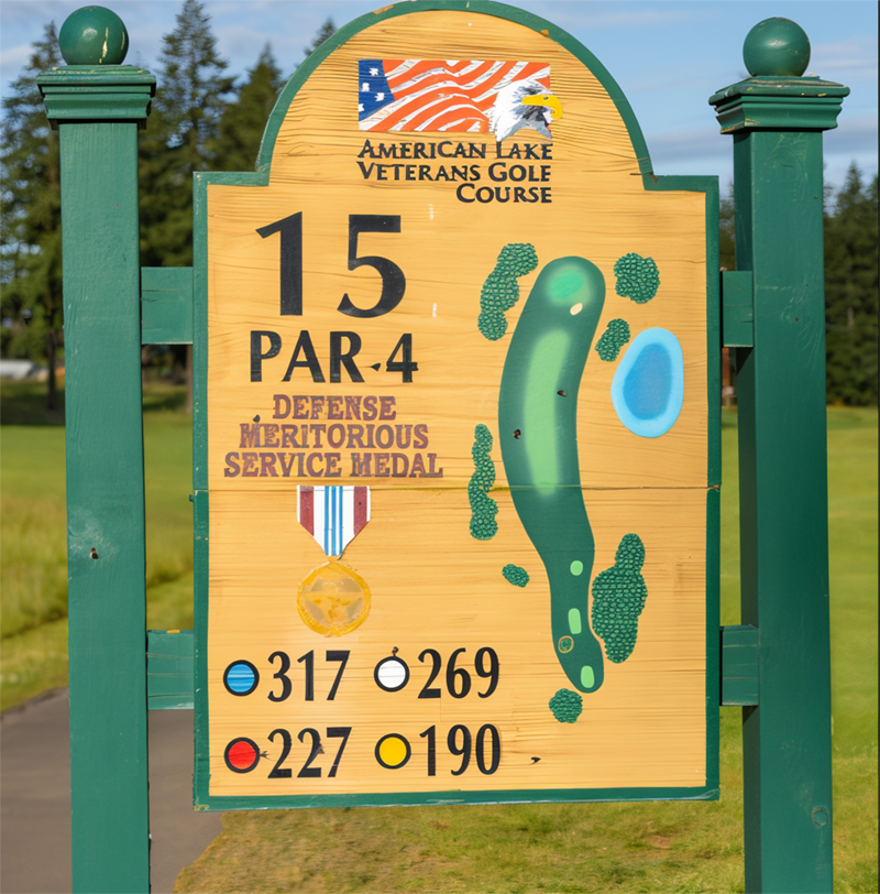 The current wooden tee sign for Hole 15, a par 4 honoring the Defense Meritorious Service Medal.