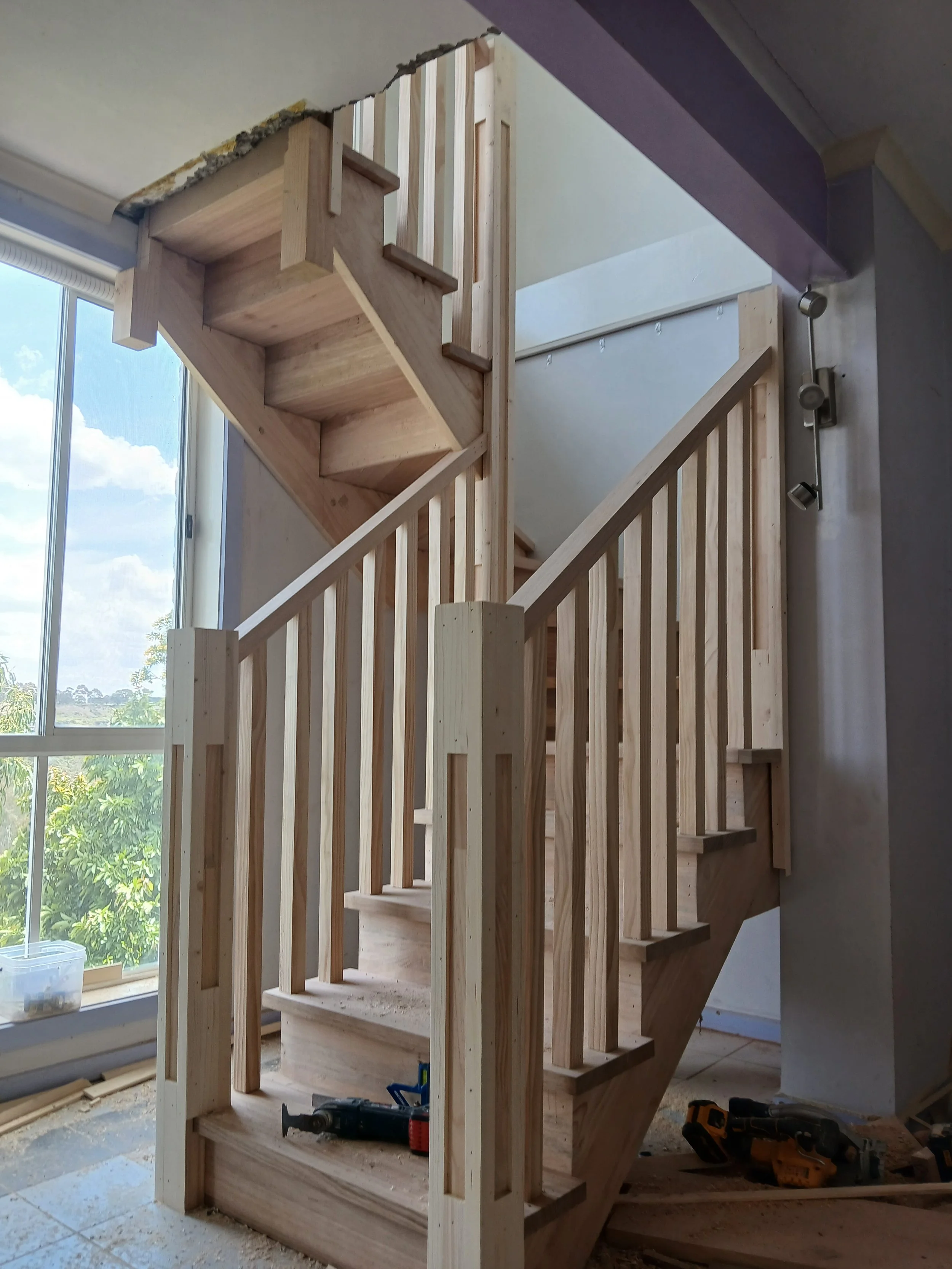hardwood hampton style stair with square hardwood balustrade.jpg