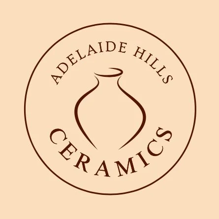 Logo for Adelaide Hills Ceramics featuring a stylized vase and text.