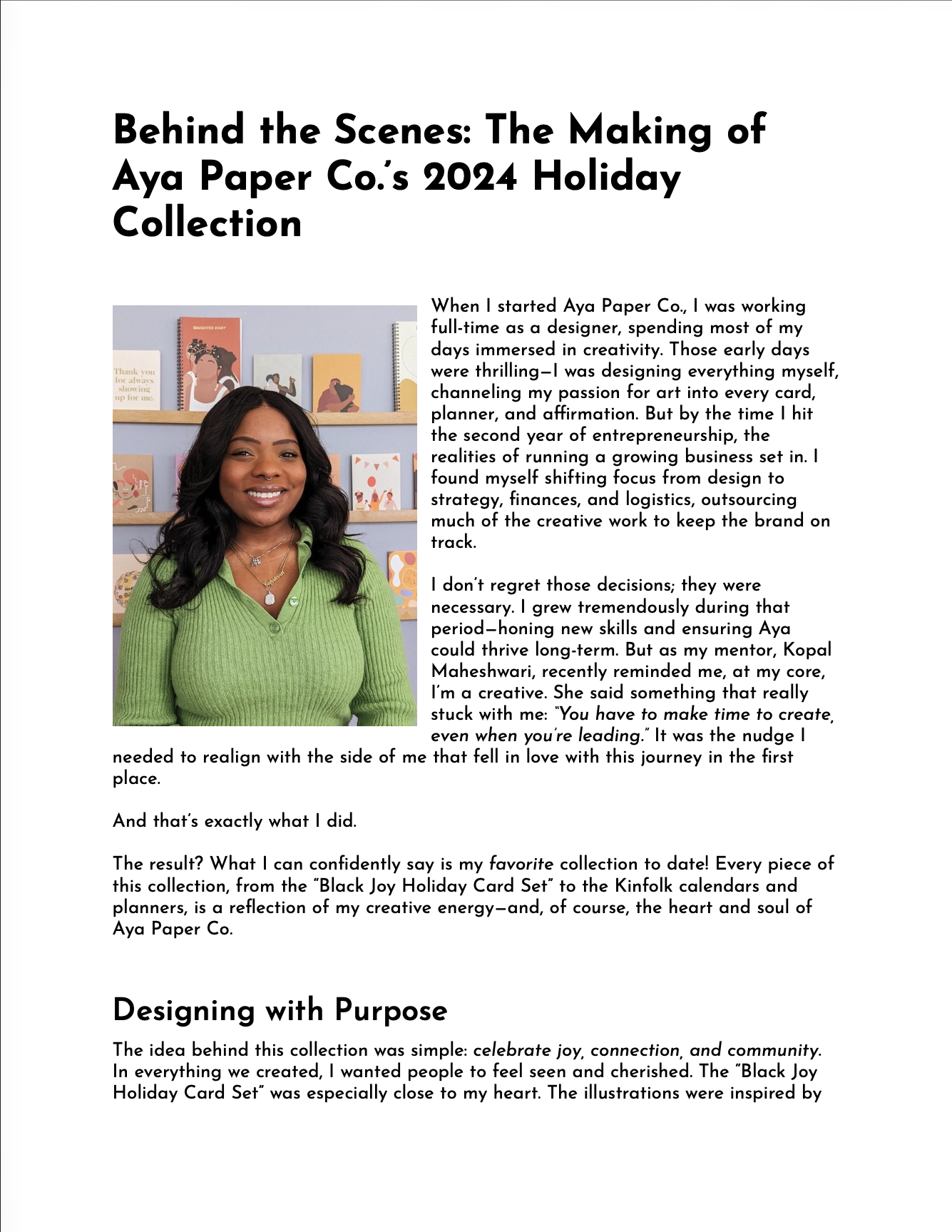 An open book featuring a portrait of a woman with dark hair and a big smile, wearing a green top. The background displays wall art with illustrated images and quotes.