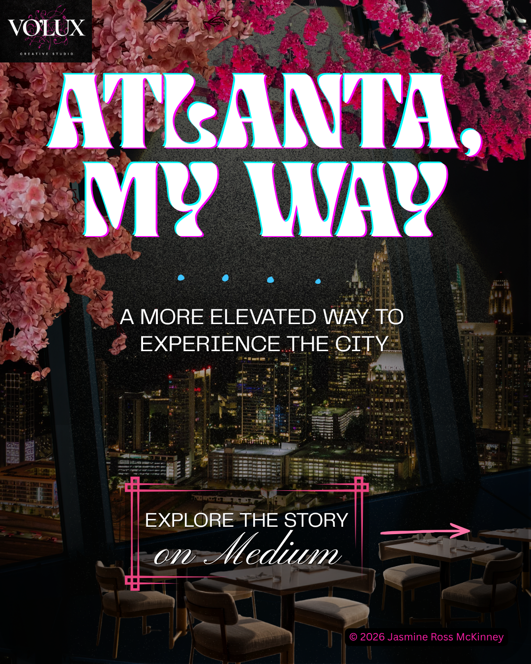 Nighttime view of a city skyline seen from a high-rise restaurant or lounge with pink cherry blossom decorations inside