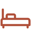 Line drawing of a bed with a headboard and pillow