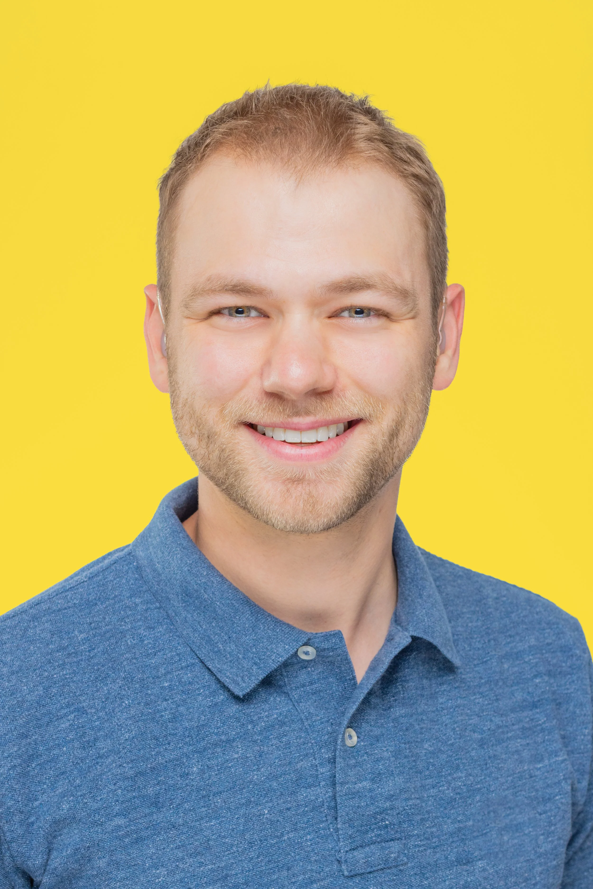 Headshot of a smiling young entrepreneur, Joel Overstreet.