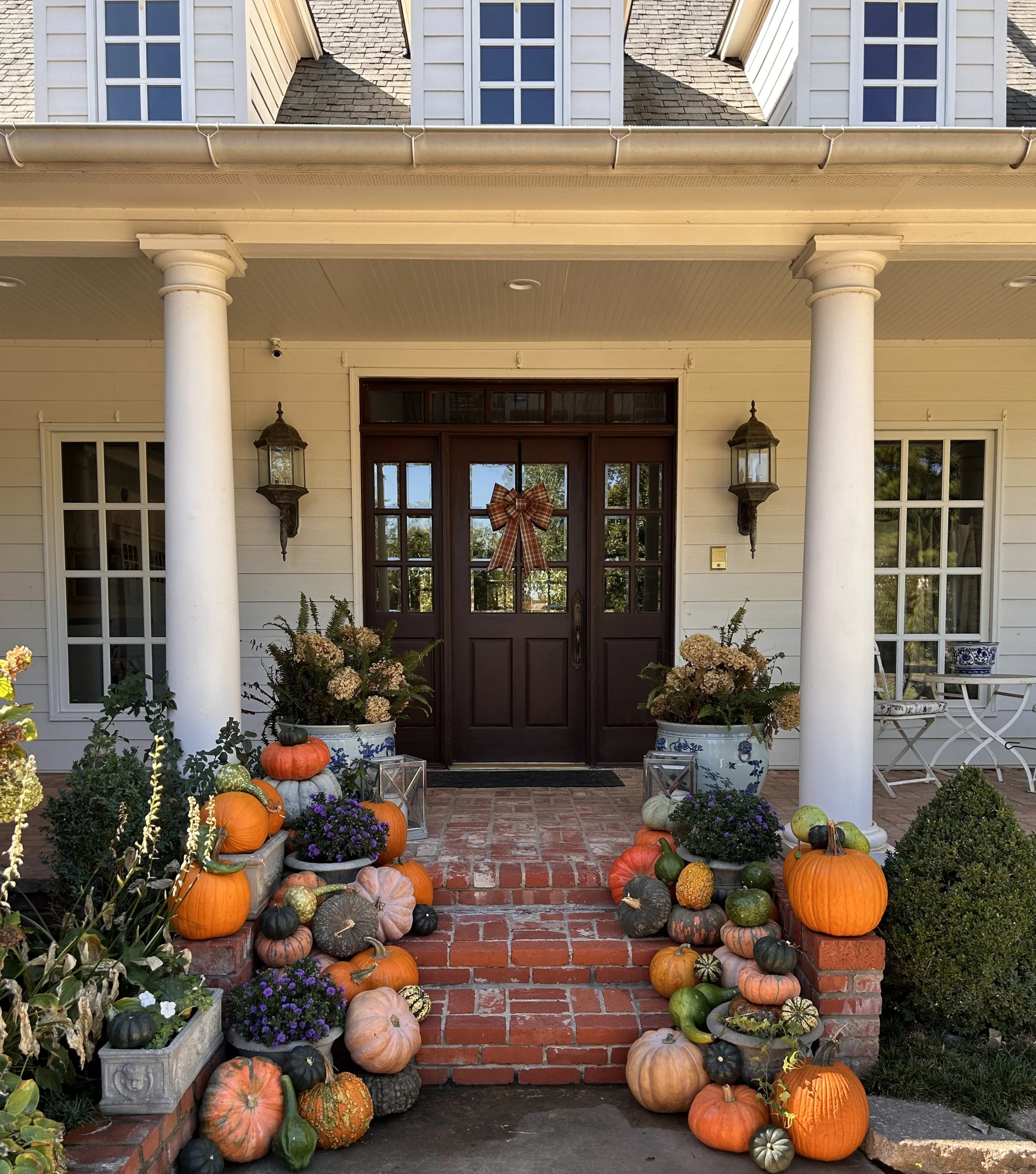 Fall porch decorating package with pumpkins in Oklahoma City Metro Porch decorating OKC