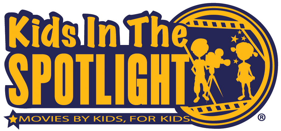 Logo for Kids In The Spotlight, featuring yellow text on a dark blue background with a circular design of children filming a movie scene.