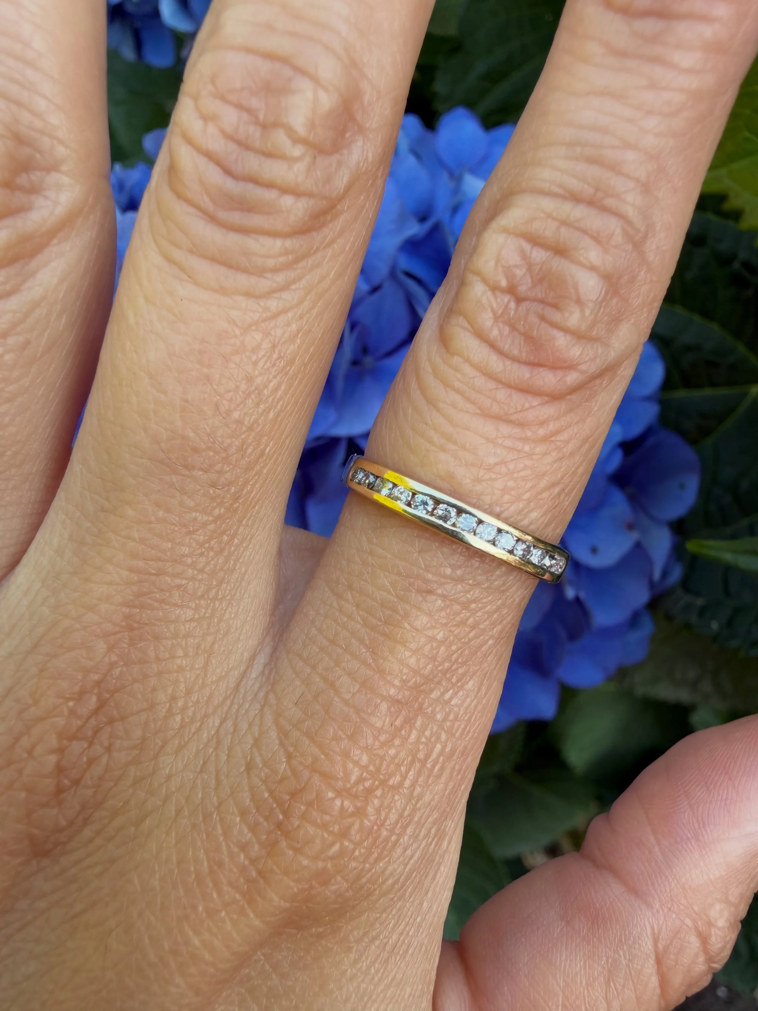 14k gold half eternity band with petite diamonds✨

Perfect for a minimalist jewelry look or for layering in a bold ring stack. It also pairs well with engagement rings 

I love channel set gemstone rings- they are super versatile and you don&rsquo;t 