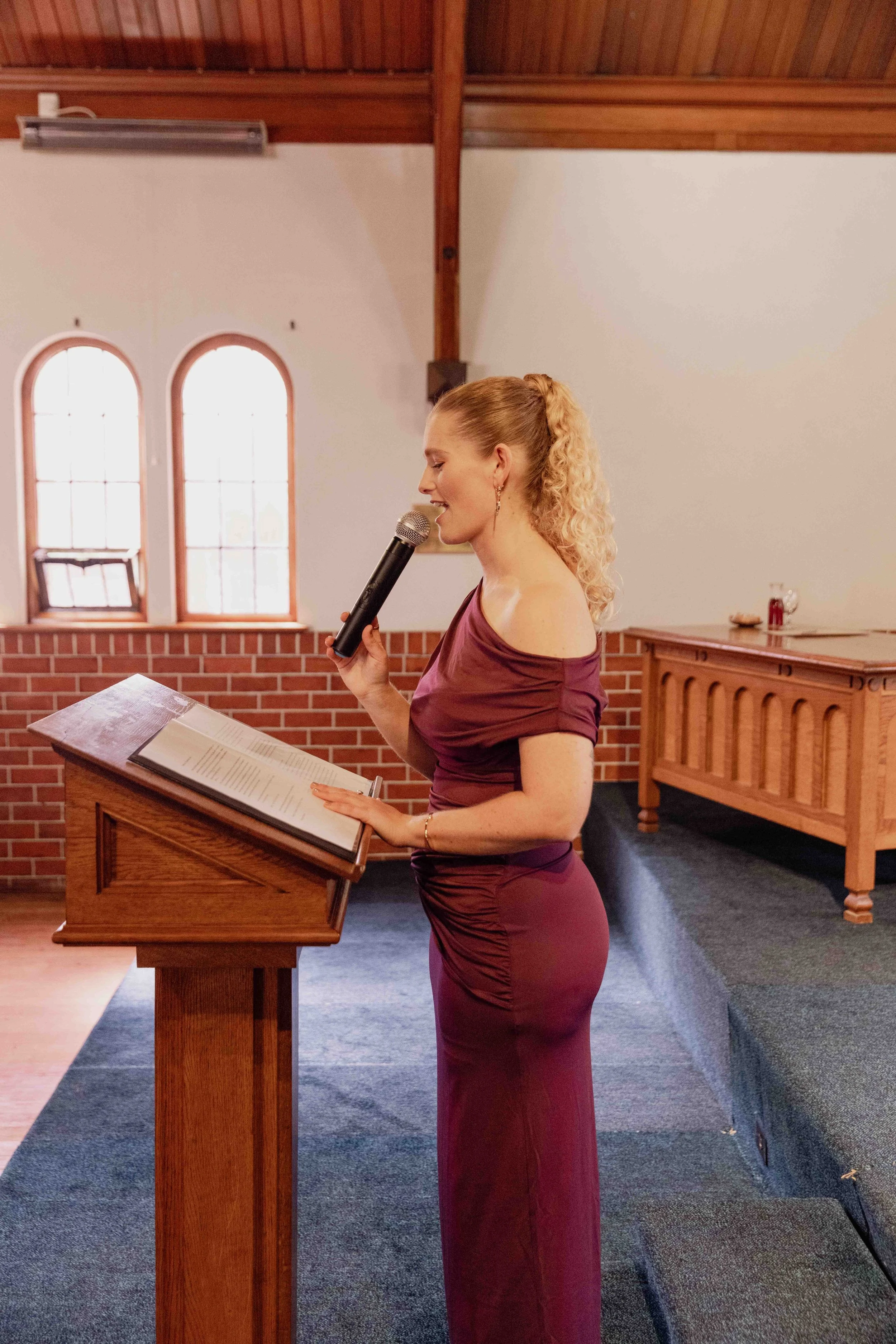 Emily Daly reading the message as a celebrant in Wellington