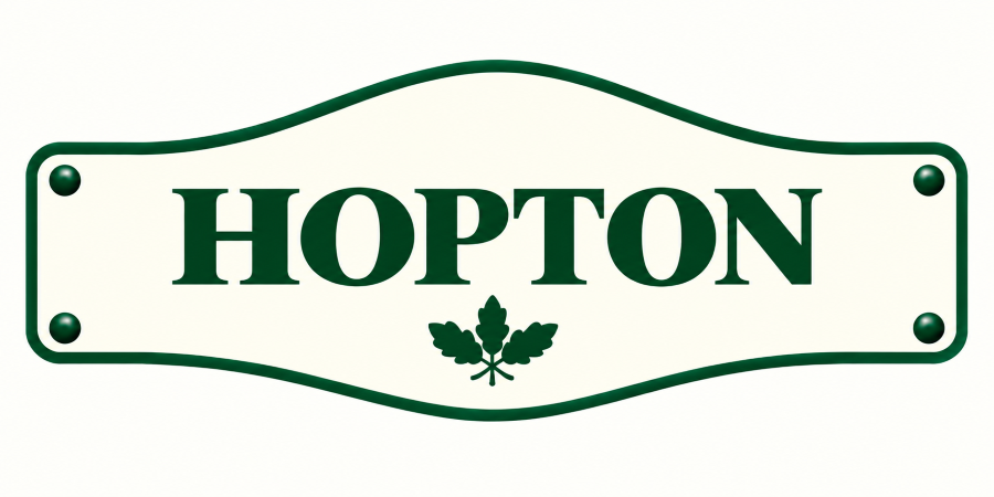 Green and white street sign with the name "HOPTON" and a leaf graphic below the text.